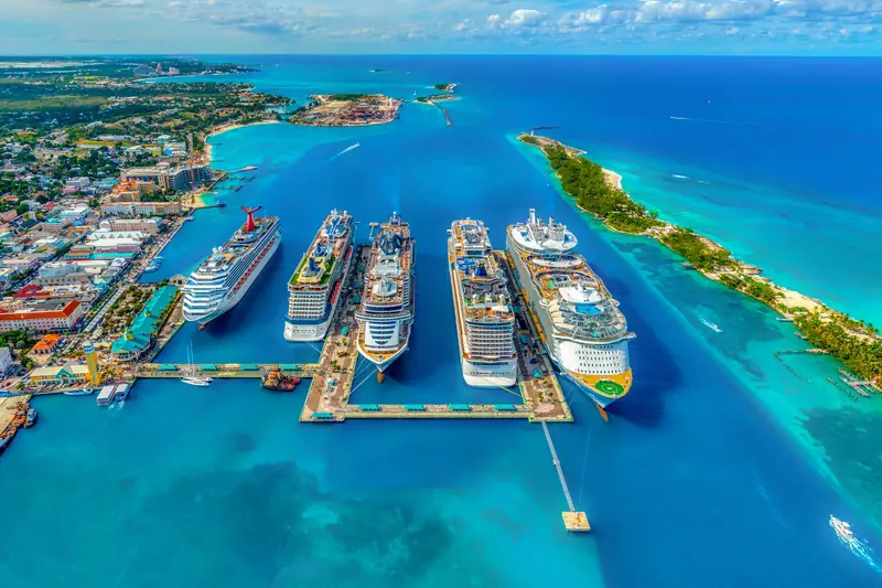 Cruise ships docked in turquoise Caribbean water